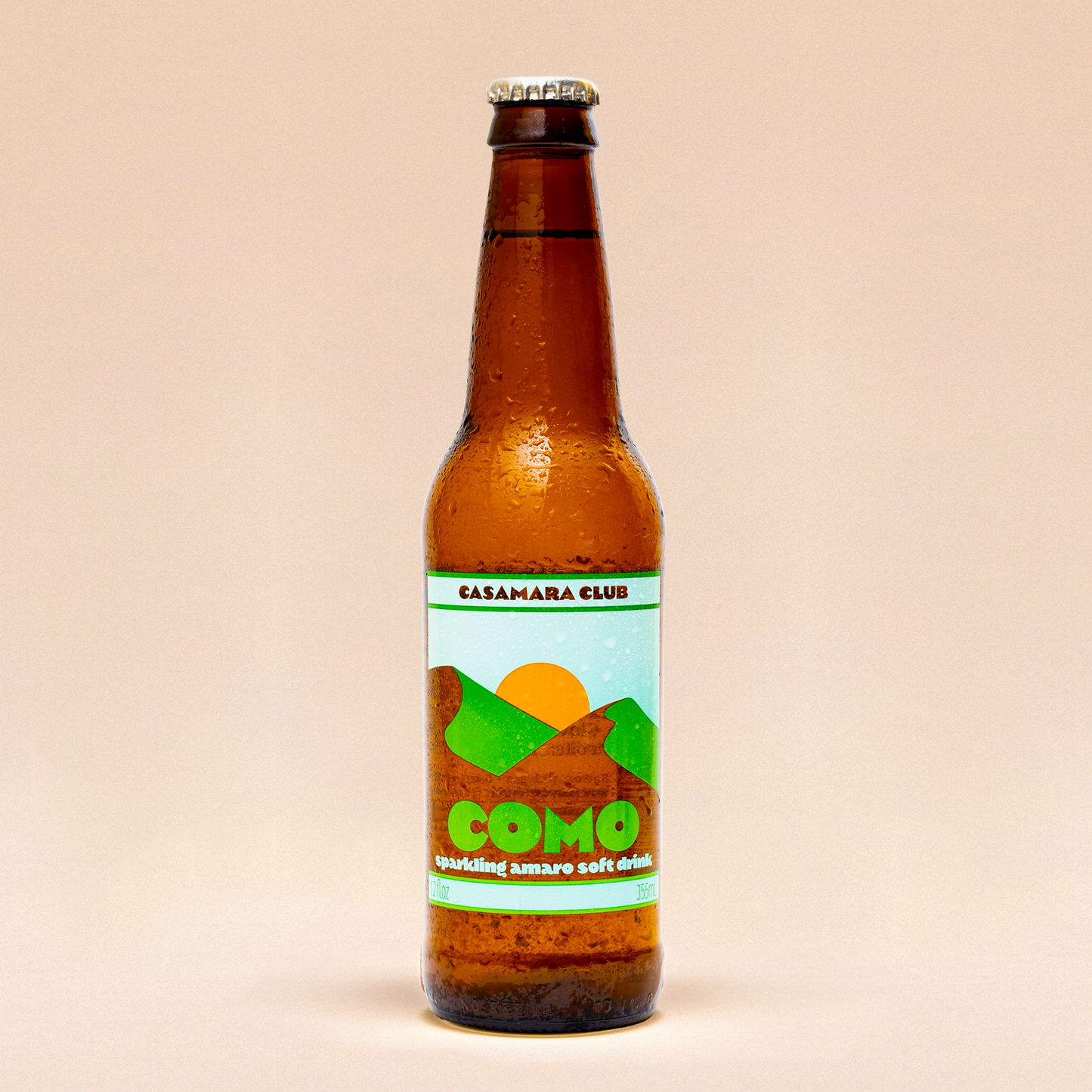 Alpine-style botanical soda — mountain amaro, COMO bottles
