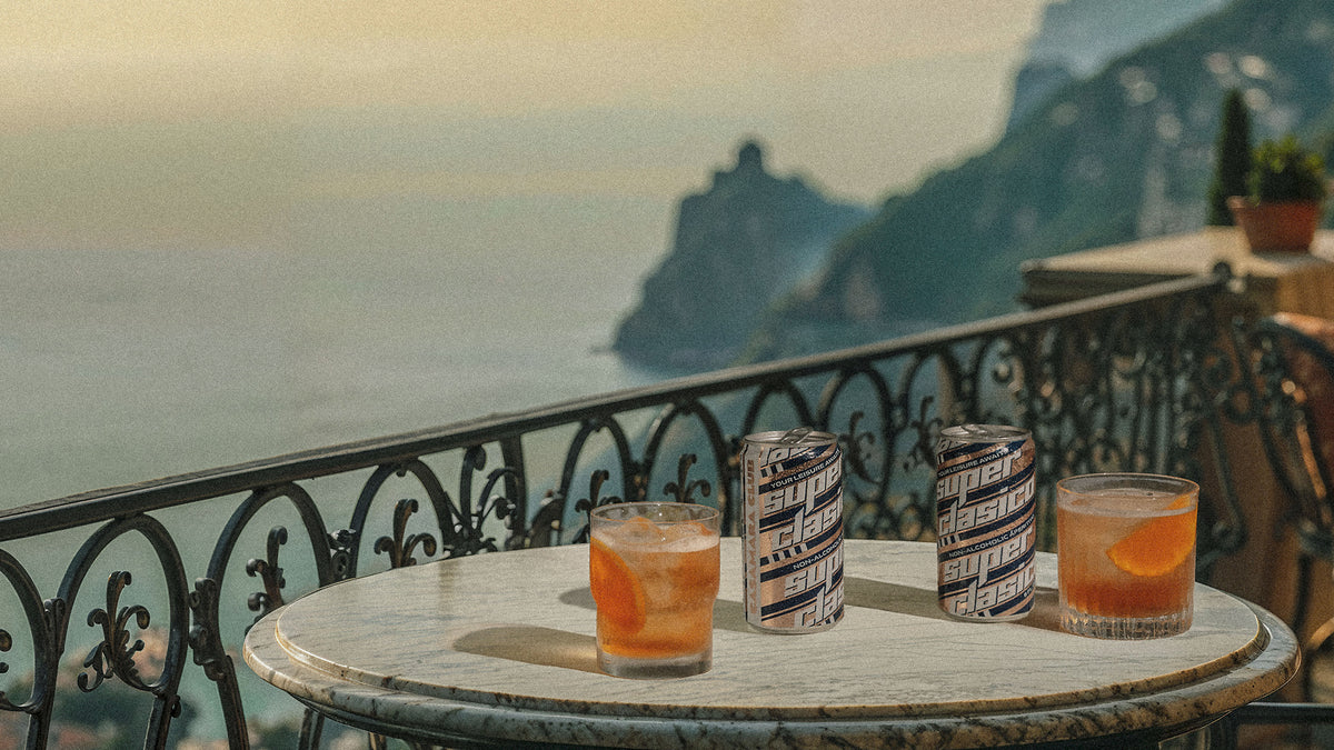 Superclasico and a cocktail on a wall above Vernazza