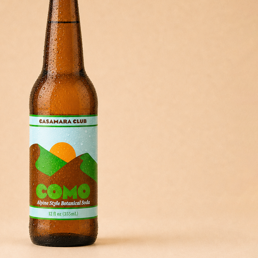 Alpine-style botanical soda — mountain amaro, COMO — bottle