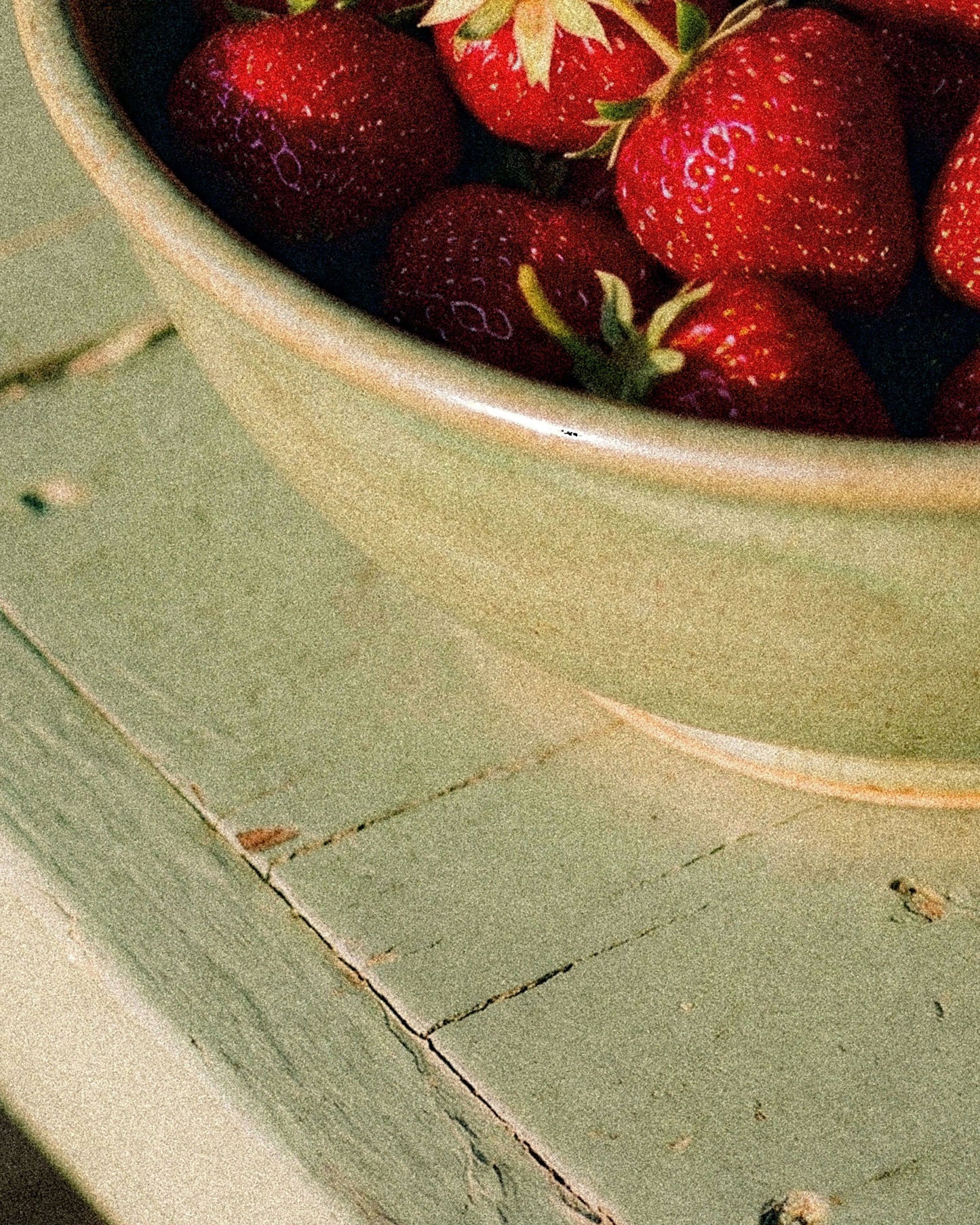 Summer strawberries in a ceramic bowl