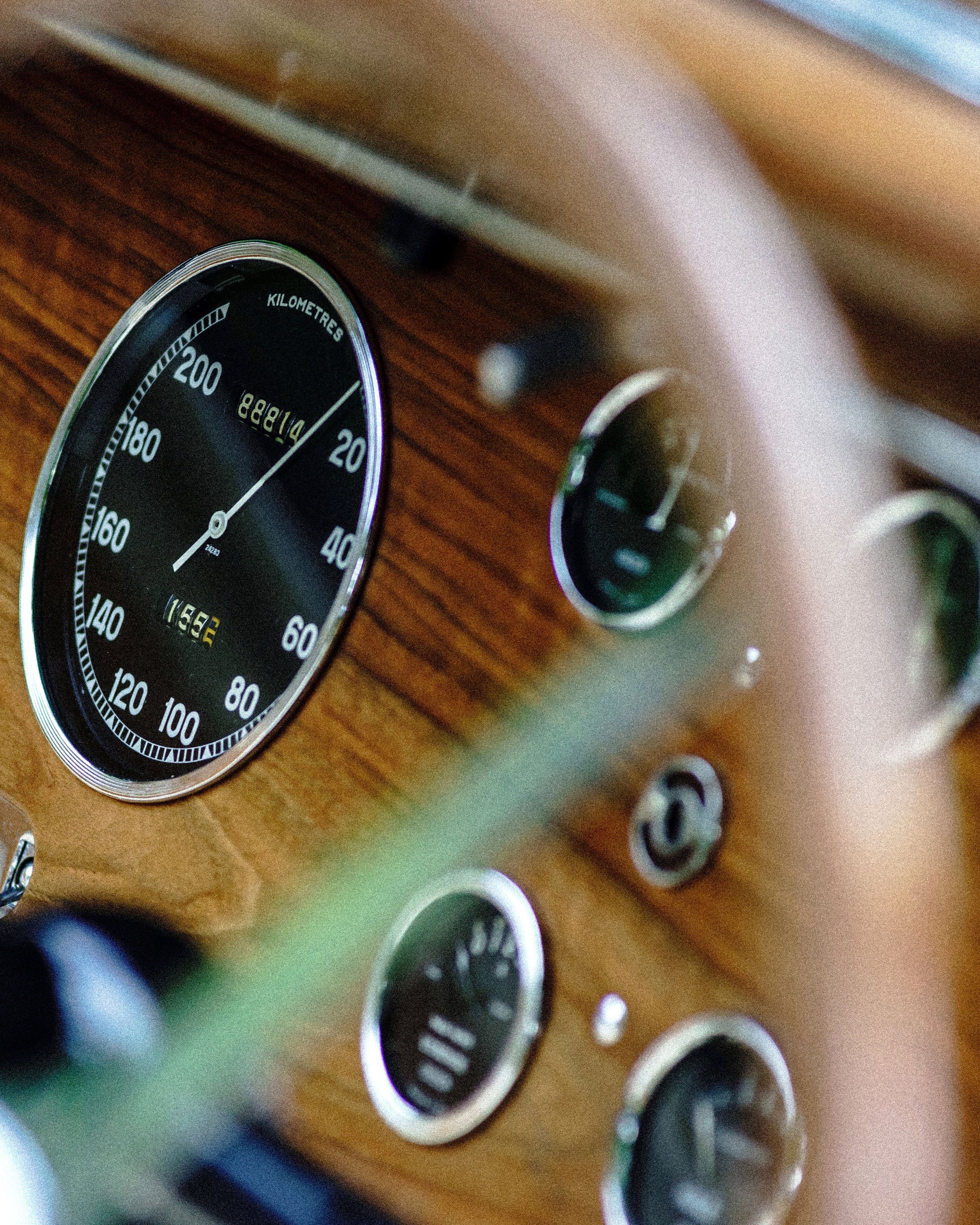 The dash of a vintage grand tourer