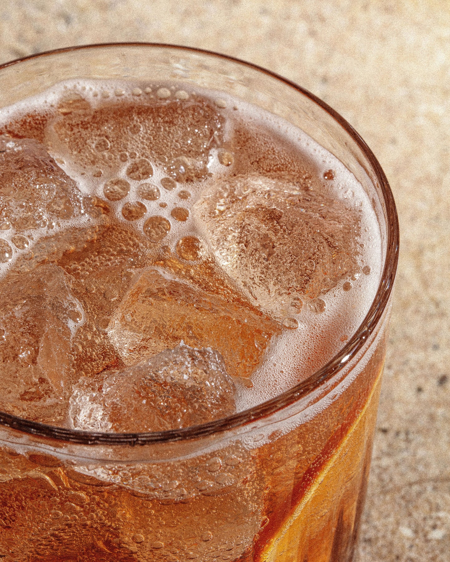 A cold aperitivo over ice, up close