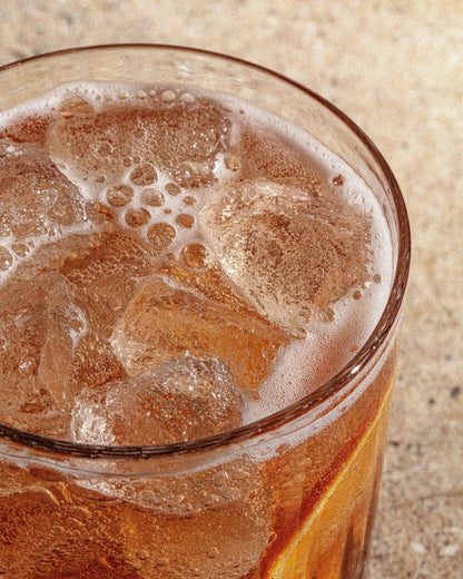 A cold aperitivo over ice, up close