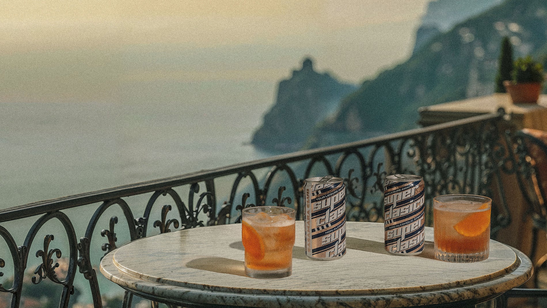 Superclasico and a cocktail on a wall above Vernazza